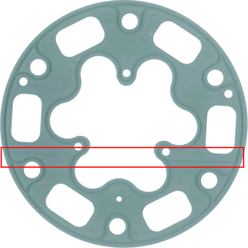 Defect example: Metal gasket with a scratch (red).